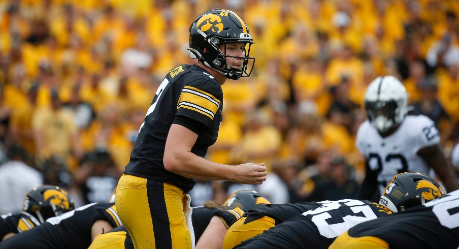 Iowa junior quarterback Spencer Petras waits for the snap in the second quarter against Penn State at Kinnick Stadium in Iowa City, Iowa, on Saturday, Oct. 9, 2021.